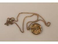 A gold sovereign dated 1918 and hallmarked 9ct mount with gold plated small chain.