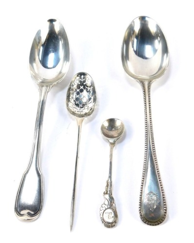 An Edward VII silver tablespoon, the handle with raised bead decoration, monogrammed, London 1904, a white metal sifter spoon, salt spoon, and a white metal dessert spoon, 1.41oz.