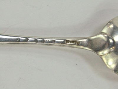 Three Georgian silver dessert spoons, comprising an Old English pattern example with bright cut decoration, London 1787, and two further spoons, initial engraved, hallmarks rubbed, 1.50oz, - 5