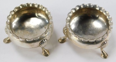 A matched pair of Victorian silver salts, each with a piecrust border, on shell capped tripod feet, maker RHAH, London 1847 and 1848, 3.65oz. (2) - 2