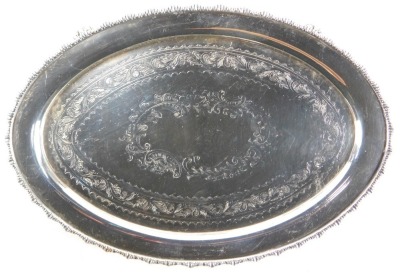 Two silver plated card trays, each of oval form, with engraved scroll decoration, 19cm x 12cm. (2) - 2