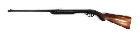 An air rifle, .22 calibre, under lever, unmarked, with wooden stock, 108cm long.