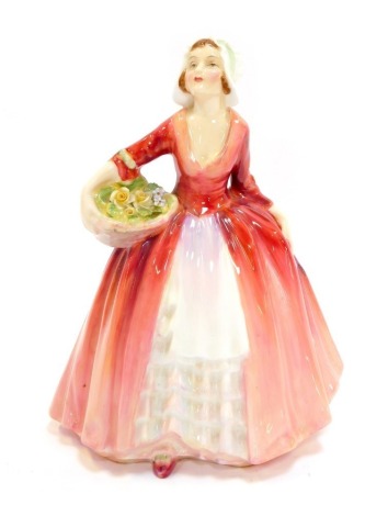 A Royal Doulton porcelain figure, modelled as Janet, HN1534.