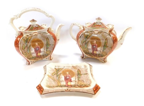 A late 19thC Staffordshire pottery teapot and stand, with transfer printed decoration depicting an Oriental figure holding parasol, in landscape, teapot 19cm high, together with a similar water jug, 23cm high. (AF)