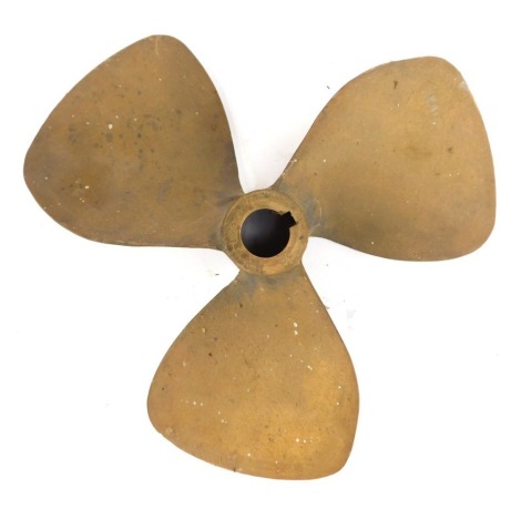 A brass propeller, marked Radice, 13X 12 RH BE, 20cm radius.