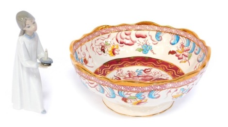 A Masons Ironstone Mason's Year of the Dragon bowl, limited edition 121/495, 25cm diameter, together with a Lladro porcelain figure of a young girl holding chamber stick. (2)