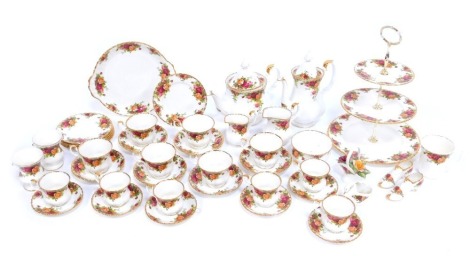 A group of Royal Albert Old Country Roses tea wares, to include tea cups and saucers, teapot, hot water jug, milk jug, sugar bowl, two tier cake stand, side plates, etc. (2 trays)