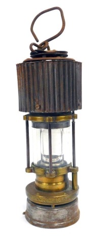 A Naylor Ltd miner's lamp, with swing handle, 30cm high.