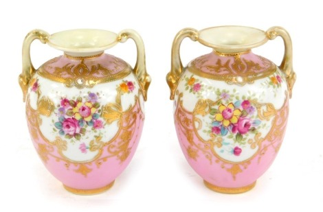 A pair of Noritake miniature two handled porcelain vases, each decorated with flowers, against a pink ground, gilt heightened, printed marks, 11cm high.