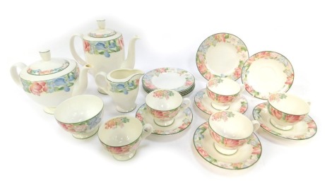 A Royal Albert porcelain part tea service decorated in the Fonteyn pattern, comprising teapot, hot water jug, five teacups and saucers, sugar bowl, milk jug, and five sandwich plates.