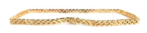 A 9ct gold necklace, Aztec design, set with slide clip and clasp, 43cm long, 29.6g all in.