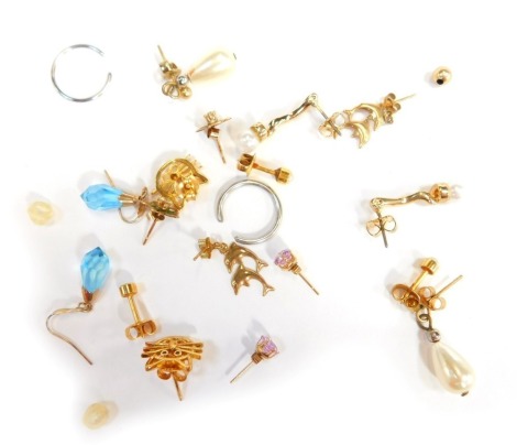 A group of 9ct gold, silver gilt, and other loose assorted earrings, comprising cultured pearls, blue topaz, and others, 8.7g all in. (a quantity)