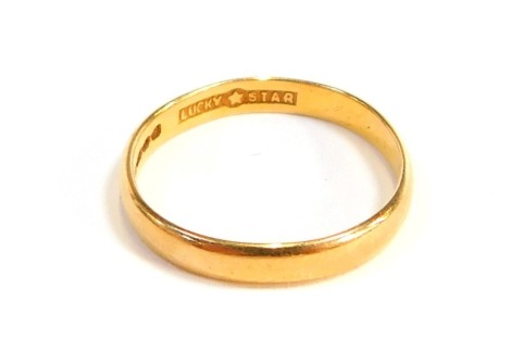 A 22ct gold wedding band, of plain design, ring size L, 2.1g.