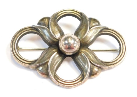 A Georg Jensen silver brooch, with interlinked outer border and central dome, stamped to reverse and numbered 305, 4.5cm wide, 8g all in.