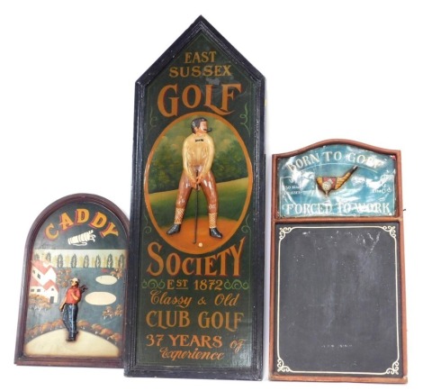 A golfing related painted wooden sign, for East Sussex Golf Society, Established 1872, 121cm high, together with a further sign bearing the writing Caddy, 59cm high, and a black board. (3)