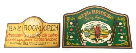 Two painted wooden golfing related signs, for T McBride's Golfing Emporium, 54cm wide, and a Golfer's Welcome painted bar sign, 59cm wide. (2)