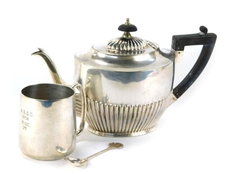 Three items of silver plated wares, comprising a 20thC silver plated teapot with ebonised knop and handle, a silver plated Canterbury souvenir spoon, and a Christening mug. (3)