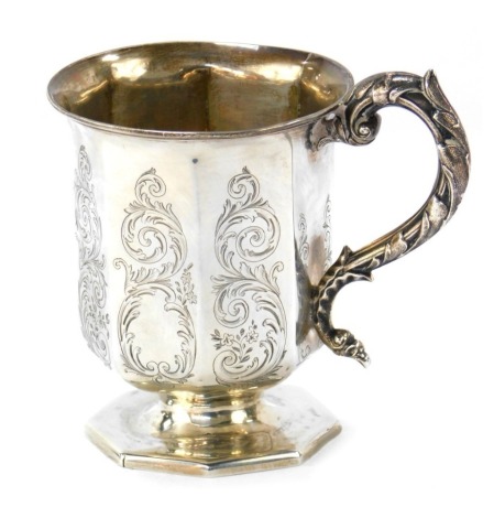 A Victorian silver christening cup, of panelled and scroll design with acanthus leaf shaped handle, on an octagonal foot, Robert Williams & Sons, Exeter 1849, 9cm high, 4.07oz. 