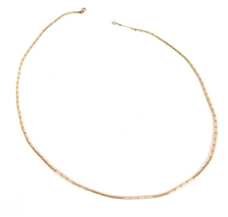 A modern beaded necklace, with plated rubbed and ball chain, 44cm long, on string strand, with a plated clasp.