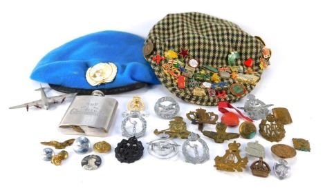 Two naval officer's caps, and assorted replica cap badges, plated ARP badge, hip flask, etc.