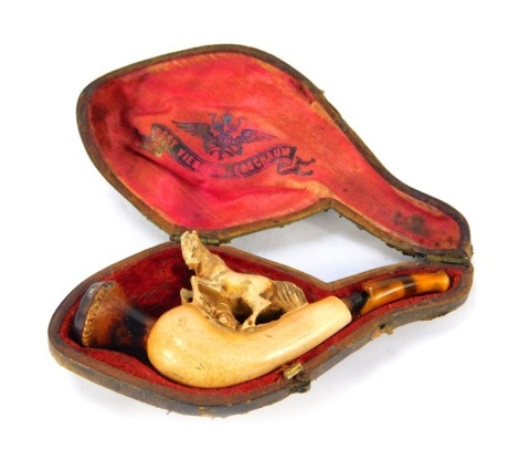 A Meerschaum pipe, with an amber cheroot and carved horse decoration, in fitted case. (AF)