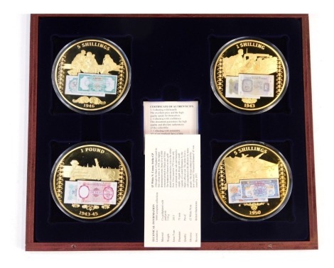 Four commemorative proof coins from the British Military Money series, in fitted case.