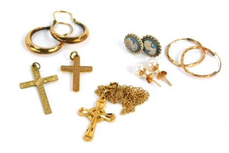 A group of 9ct gold and other jewellery, comprising crucifix pendant and chain, two pairs of 9ct gold hoops, 3.4g all in, and a small group of unmarked white and yellow metal jewellery. (a quantity)