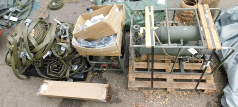 An Army water purification system, X2325, c1980s, and accessories, to include a Lister Pet VR Military water pump, ERM1143, Army filtration kit, water taps, pumps, 2500 gallon water tank, etc. (1 bag), an army lathe sack and contents, of 2500 Gallon wate