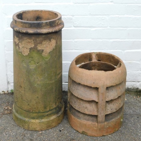 Two terracotta chimney pots, the largest 63cm high.