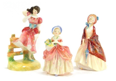 Three Royal Doulton porcelain figures, modelled as Summer, HN2086, Cissy, HN1809, and Paisley Shawl, HN1988.