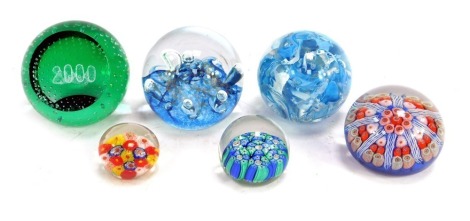 Six glass paperweights, to include a Caithness Sea Dance paperweight, 80cm high, Millefiori paperweight, etc.