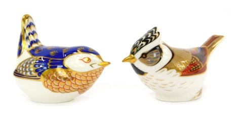 Two Royal Crown Derby porcelain Collectors Guild paperweights, comprising Crested Tit and a further bird, each with gold stopper and red printed marks, boxed.