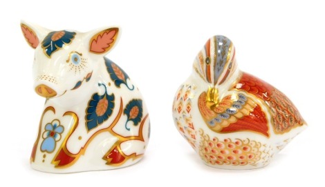 Two Royal Crown Derby porcelain Collectors Guild paperweights, comprising Snuffle Piglet and Teal Duckling, gold stoppers and red printed marks, boxed.