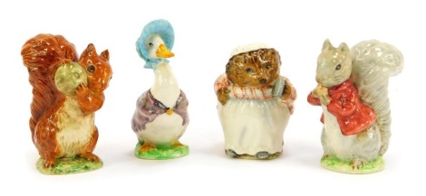 Four Beswick Beatrix Potter pottery figures, comprising Timmy Tip Toes, Squirrel Nutkin, Mrs Tiggy-Winkle, and Jemima Puddle-Duck.