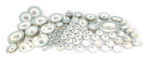 A comprehensive Royal Worcester porcelain tea, dinner and coffee service decorated in the Woodland pattern, to include two tureens and covers, coffee cans and saucers, teacups and saucers, two handled soup bowls and saucers, gravy boats, dinner plates, so