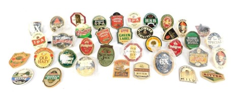 A collection of beer tap labels, to include Fullers London Pride, Flowers IPA, George Gayle & Co HSB Bitter, etc. (a quantity)