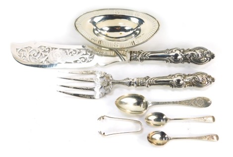 A Victorian silver spoon, with engraved decoration, reserve monogram engraved, London 1863, Edward VII silver oval sweet meat dish, raised on four paw feet, Sheffield 1904, pair of silver coffee spoons, Sheffield 1900, and a pair of George V silver sugar 