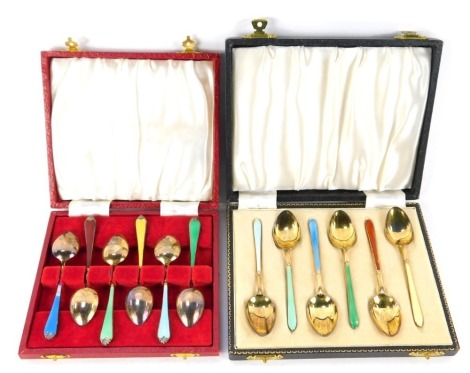 A set of six Elizabeth II silver and enamel teaspoons, cased Birmingham 1958, and a set of six silver gilt and enamel coffee spoons, cased, Birmingham 1958, 4.90oz.