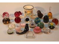 Various decorative paperweights including Mdina