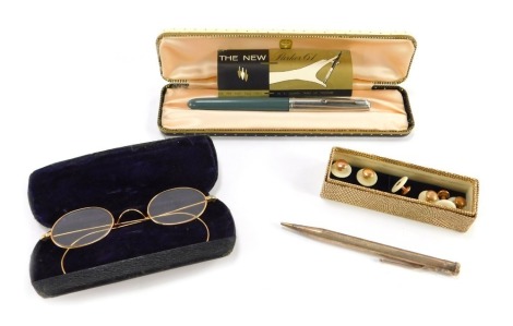 A Parker 61 fountain pen, cased, Yard-O-Lead silver propelling pencil, with engine turned decoration, rectangular reserve named to Michael Davies, a pair of early 20thC yellow metal rimmed spectacles, and various shirt studs. (a quantity)