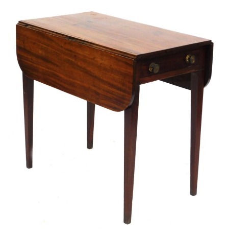 A 19thC mahogany Pembroke table, the top with a rounded edge above one frieze drawer and one dummy drawer, on square tapering legs, 71cm high, 76cm wide.