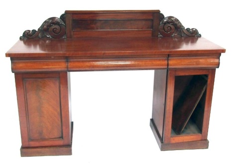 A Victorian mahogany sideboard, the raised carved back above three frieze drawers, flanked by two panelled doors, on plinth, 122cm high, 167cm wide, 54cm deep.