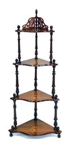 A Victorian walnut and inlaid waterfall corner whatnot, of four shelves, with inlaid urn decoration, raised on turned and spiral fluted columns, raised on ball feet, 141cm high.