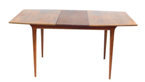 A late 20thC Mcintosh teak draw leaf dining table, with one additional leaf, raised on turned legs, 74cm high, 114cm wide, 152.5cm extended, 82cm deep.