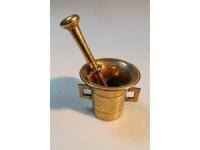 A 19thC brass pestle and mortar.