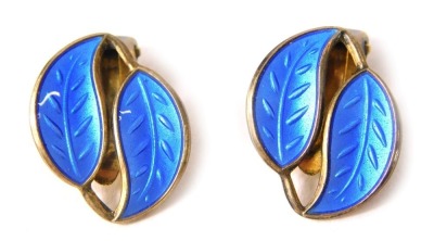 A pair of David Anderson Norwegian silver and blue enamel clip on earrings, each formed as two intertwined leaves, stamped DA925, 2cm high, 3.2g all in.