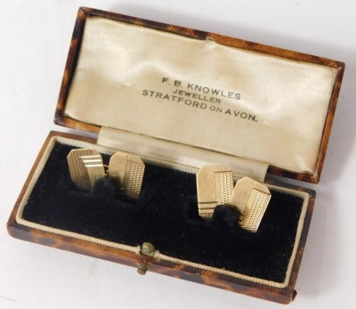 A pair of 9ct gold cufflinks, each of engine turned and cross hatched decoration, with chain link, 3.6g all in, in FB Knowles Jewellers of Stratford Upon Avon box. - 3