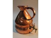 A large copper gallon jug with attached brass tap