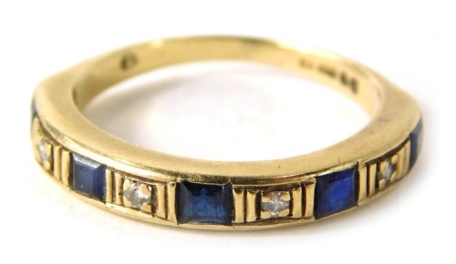 A 9ct gold half hoop dress ring, set with five rectangular cut sapphires, and four illusion set tiny diamonds, ring size N, 2.6g all in.