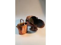 A Great Western Railway gallon water bucket and a beaten copper helmet coal scuttle.